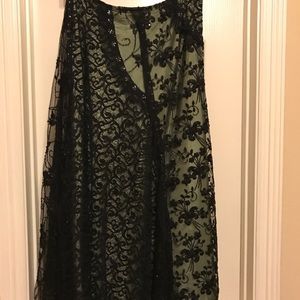 Brand new lace over satin skirt. Size 6.